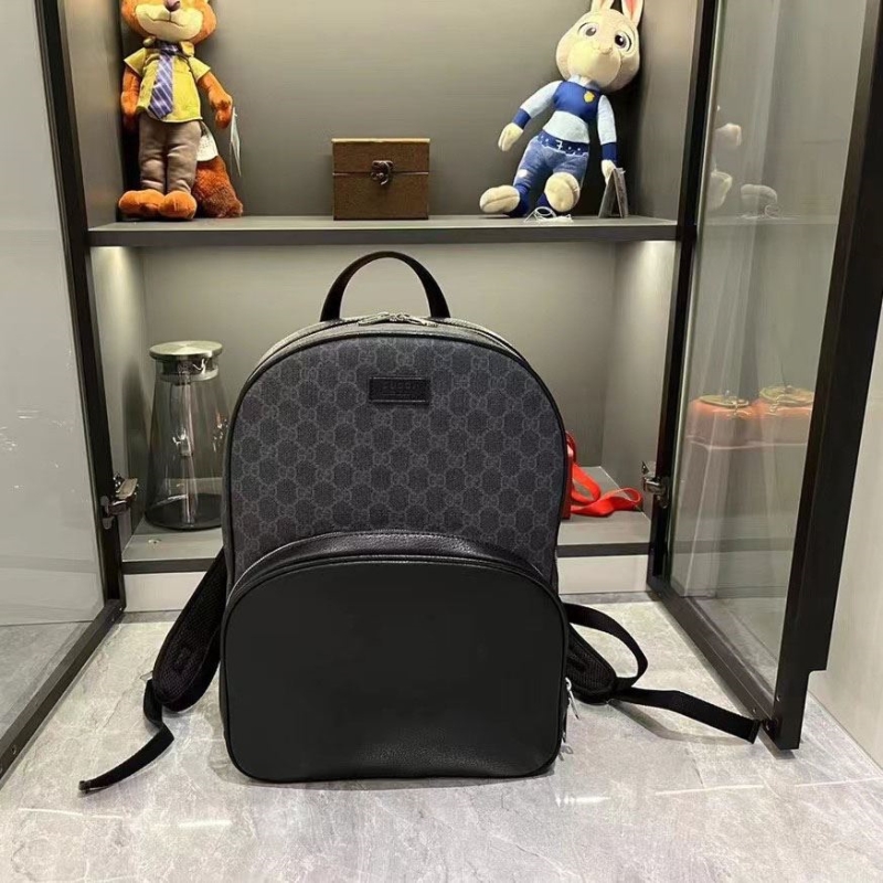 G*u*i backpacks